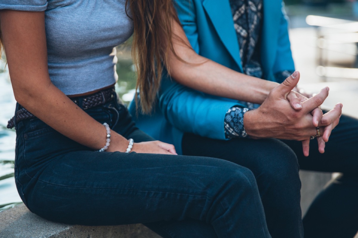 A couple holding hands